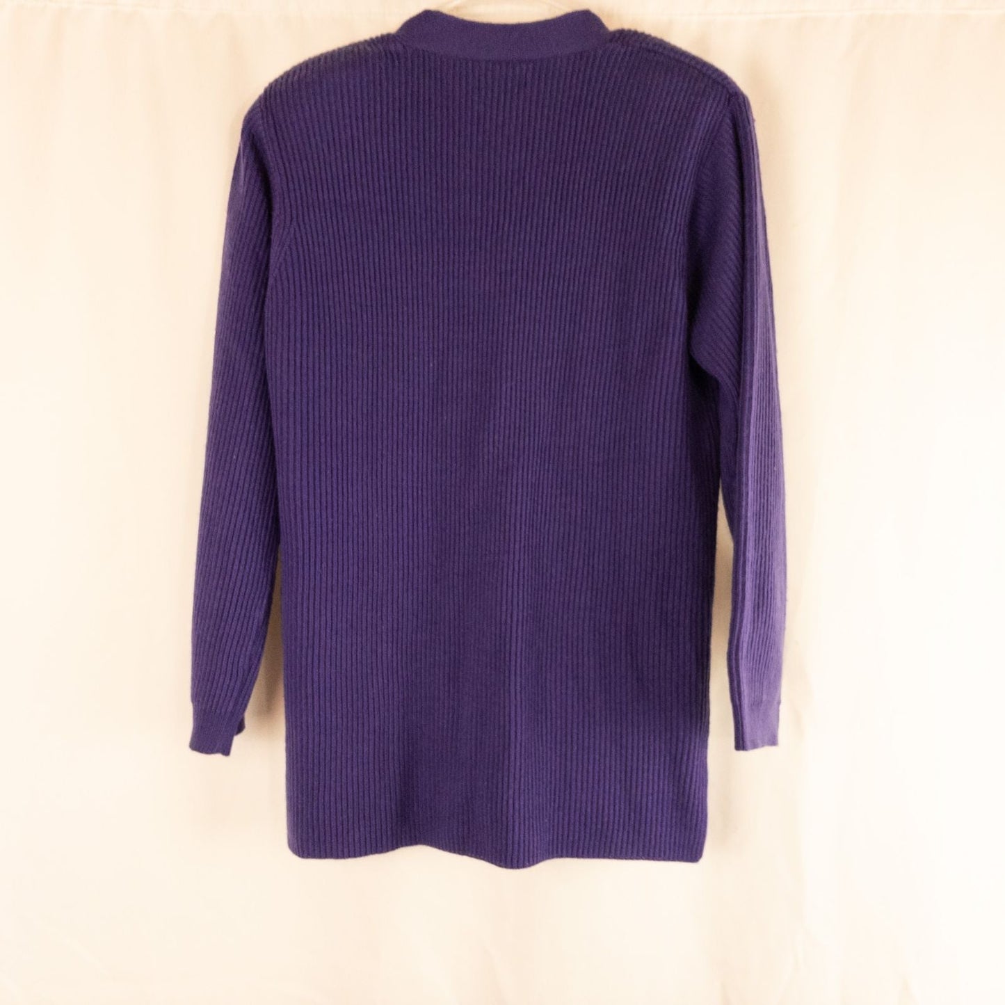 Vintage Yarnworks purple chunky knit cardigan with button front and two pockets hanging on hanger image 7