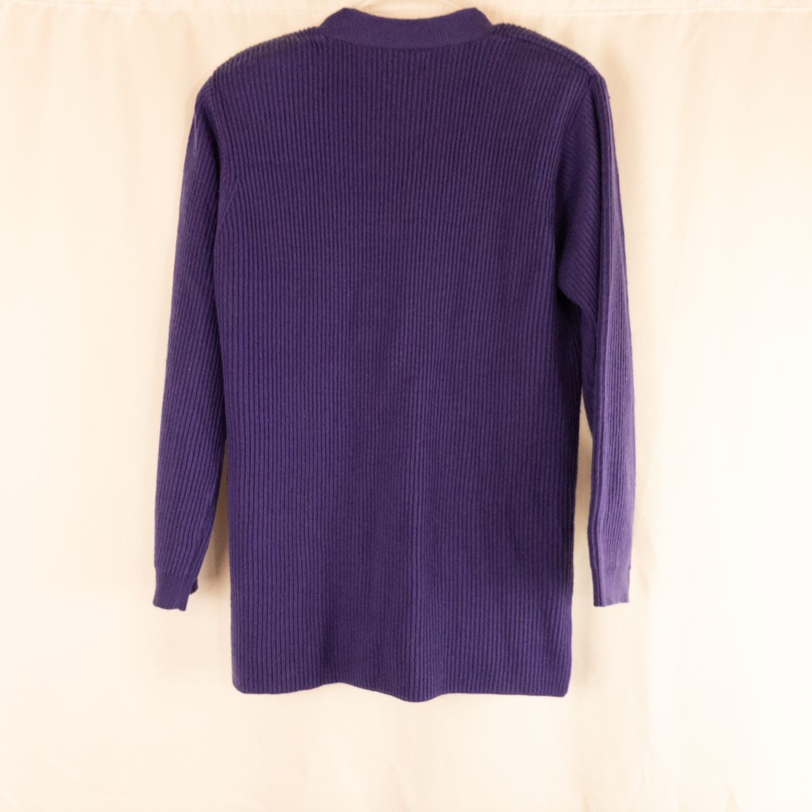 Vintage Yarnworks purple chunky knit cardigan with button front and two pockets hanging on hanger image 7