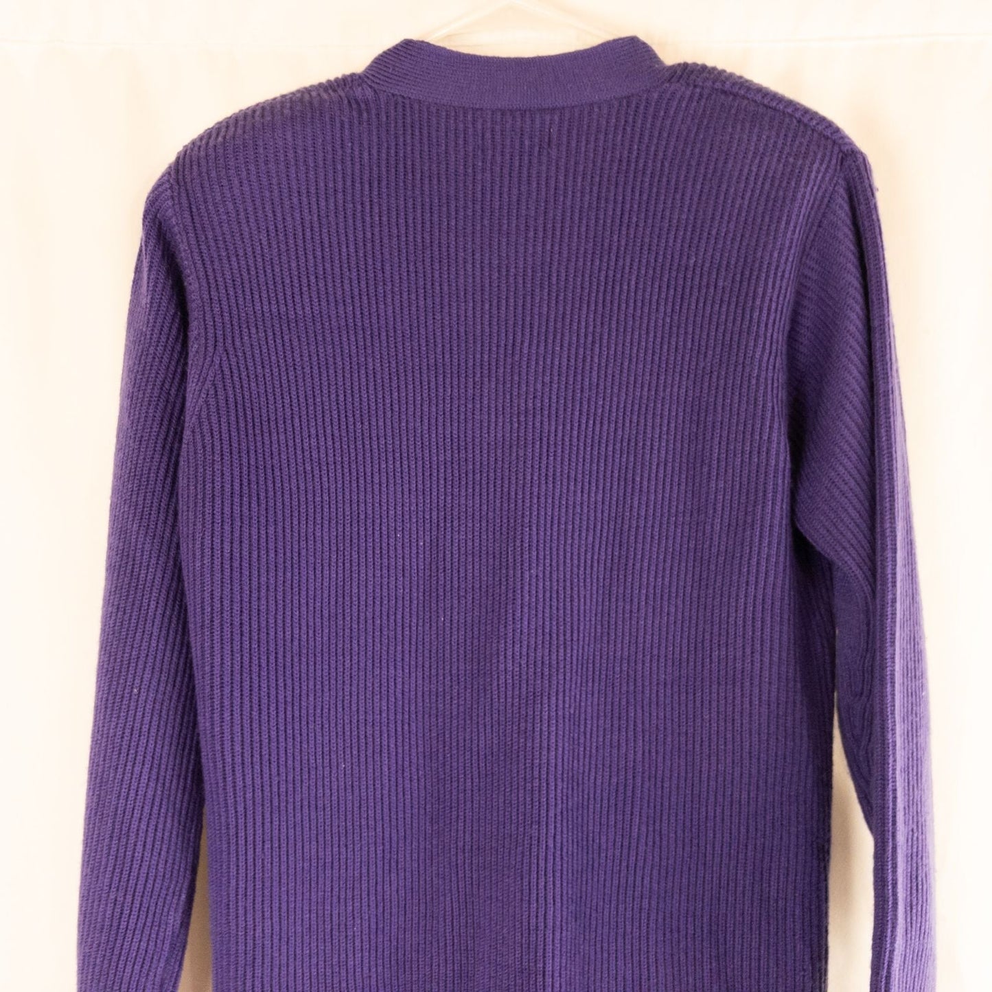 Vintage Yarnworks purple chunky knit cardigan with button front and two pockets hanging on hanger image 8