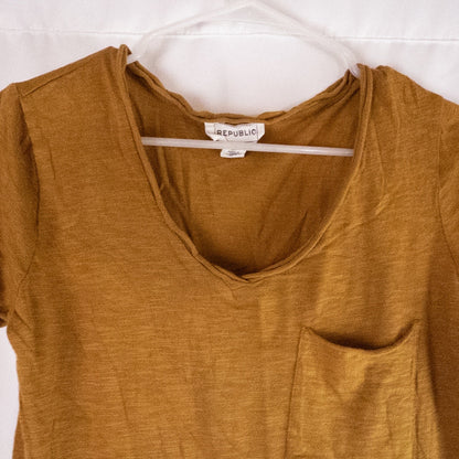 Republic brown scoop neck t-shirt with chest pocket hanging on a white hanger image 2