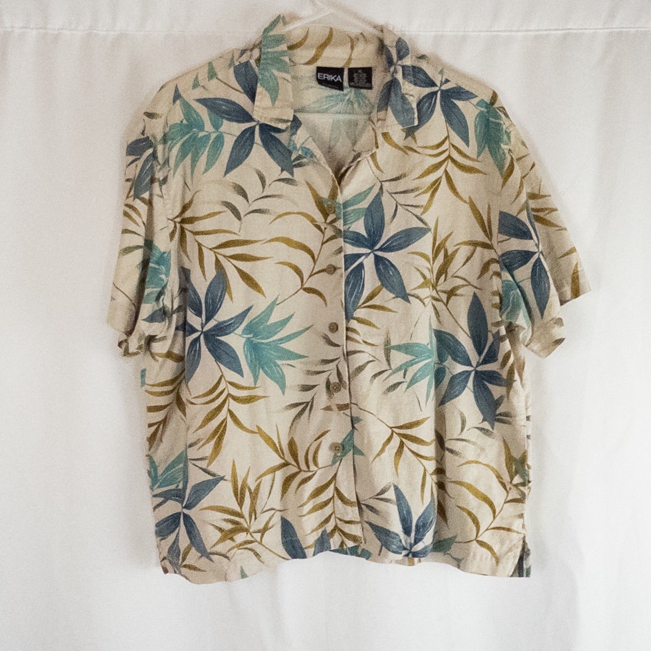 Erika vintage unisex Hawaiian shirt in cream with brown and blue leaf pattern, short sleeves and button front
