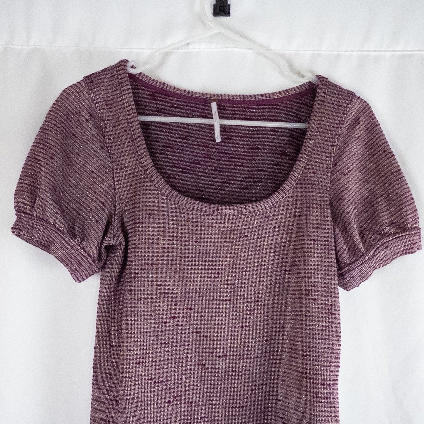 Free People knit purple and gold short puff sleeve sweater top on hanger against white background image 2