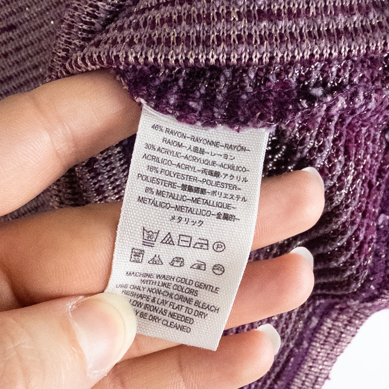 Free People knit purple and gold short puff sleeve sweater top on hanger against white background image 8