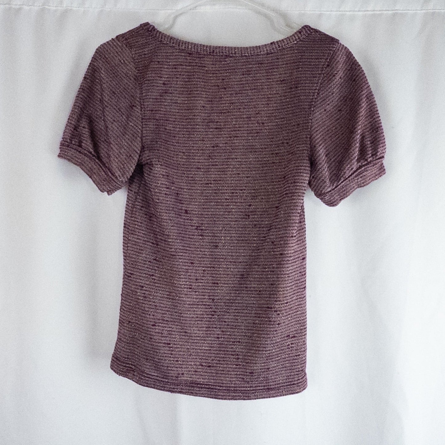 Free People knit purple and gold short puff sleeve sweater top on hanger against white background image 5