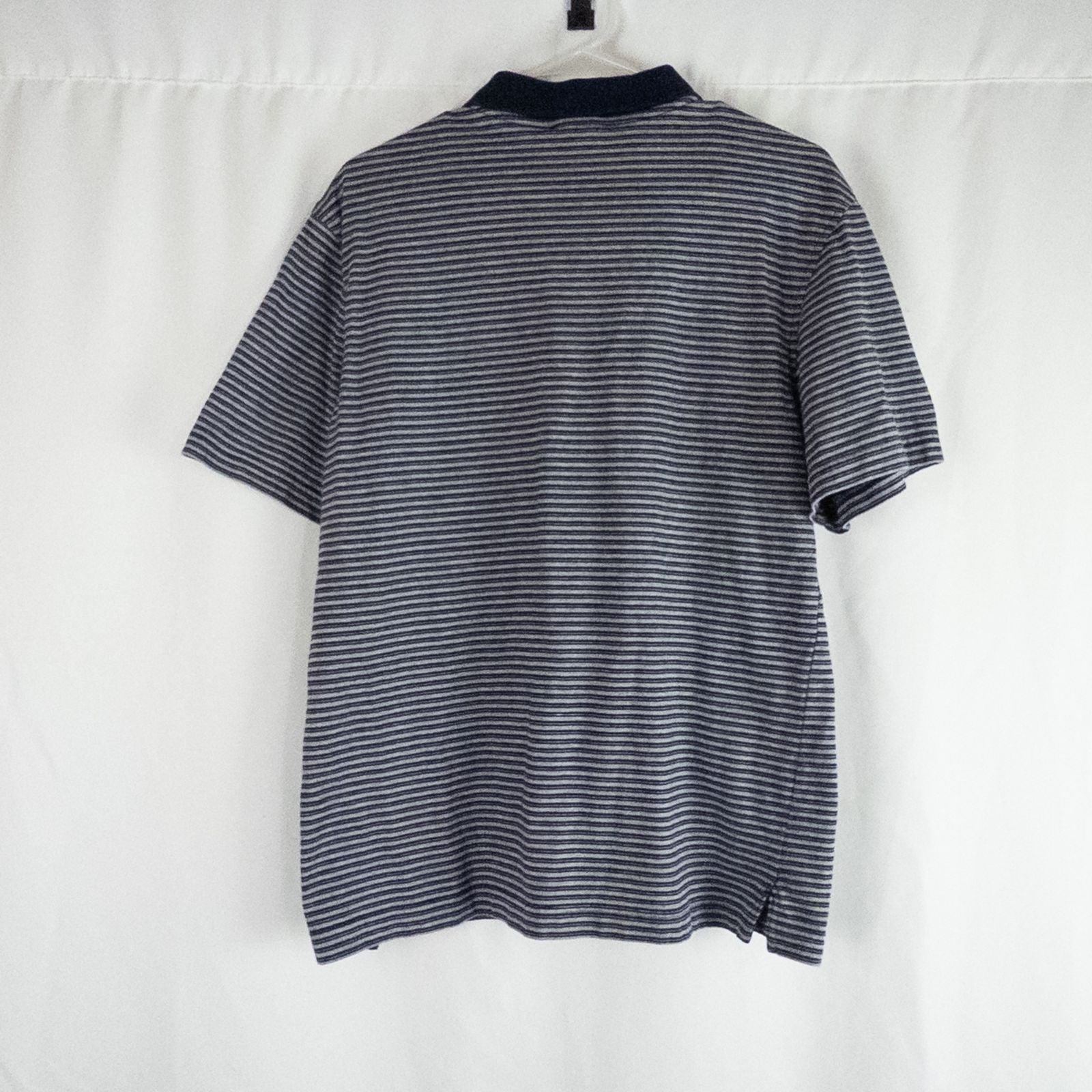 Puritan vintage men's medium blue gray striped polo shirt with collar and button closure hanging on a hanger front and back views image 6