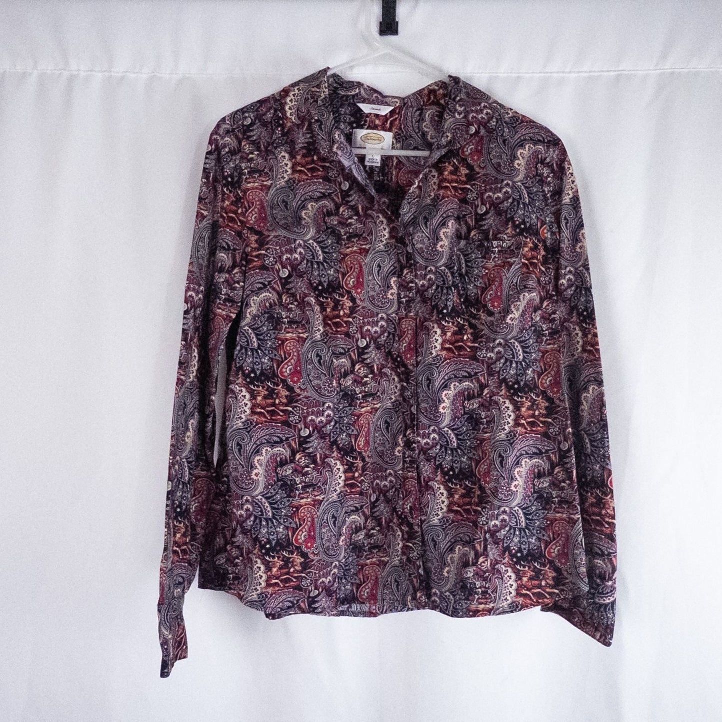 Talbots maximalist Santa Claus paisley print pink and red women's long sleeve button shirt hanging on white hanger