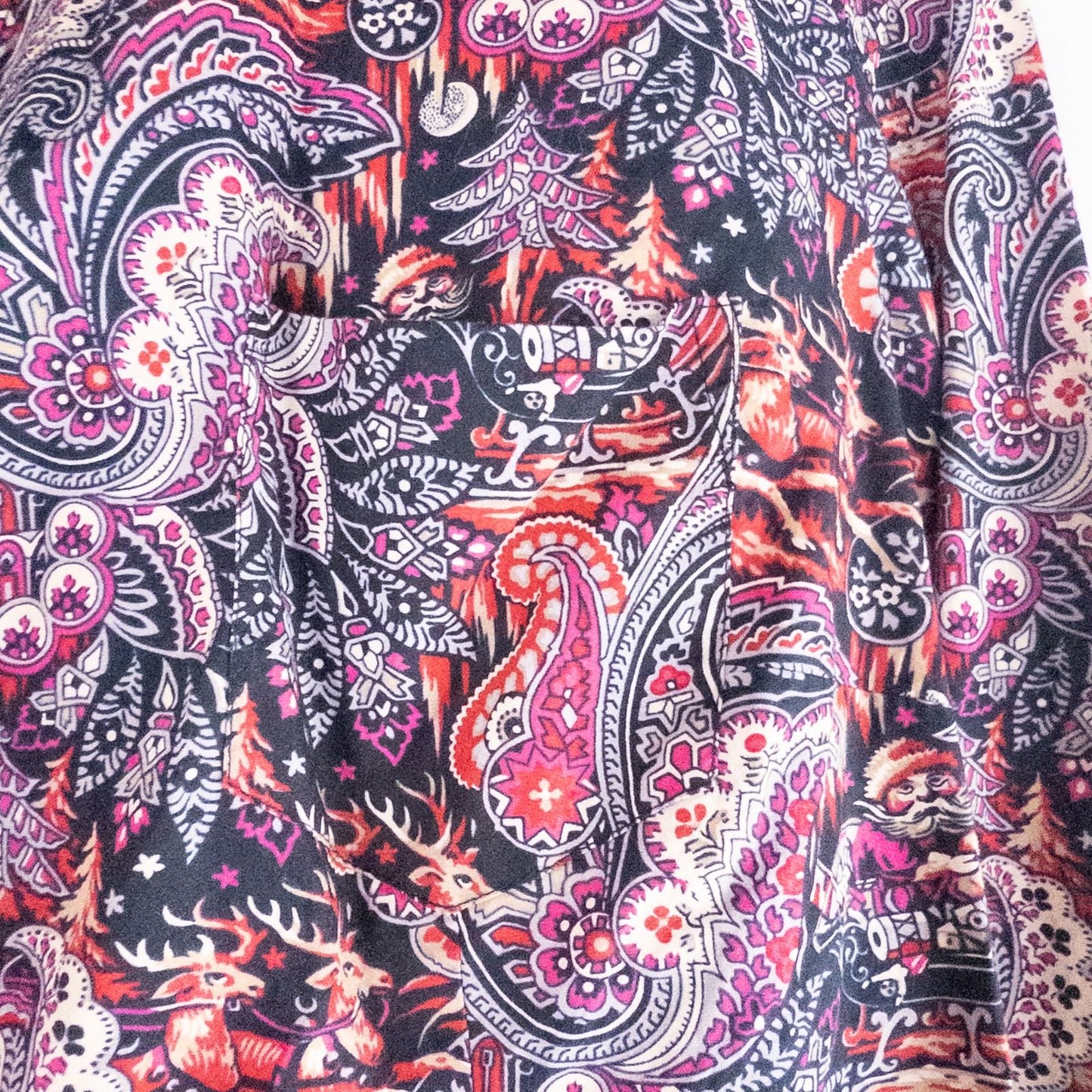 Talbots maximalist Santa Claus paisley print pink and red women's long sleeve button shirt hanging on white hanger image 3