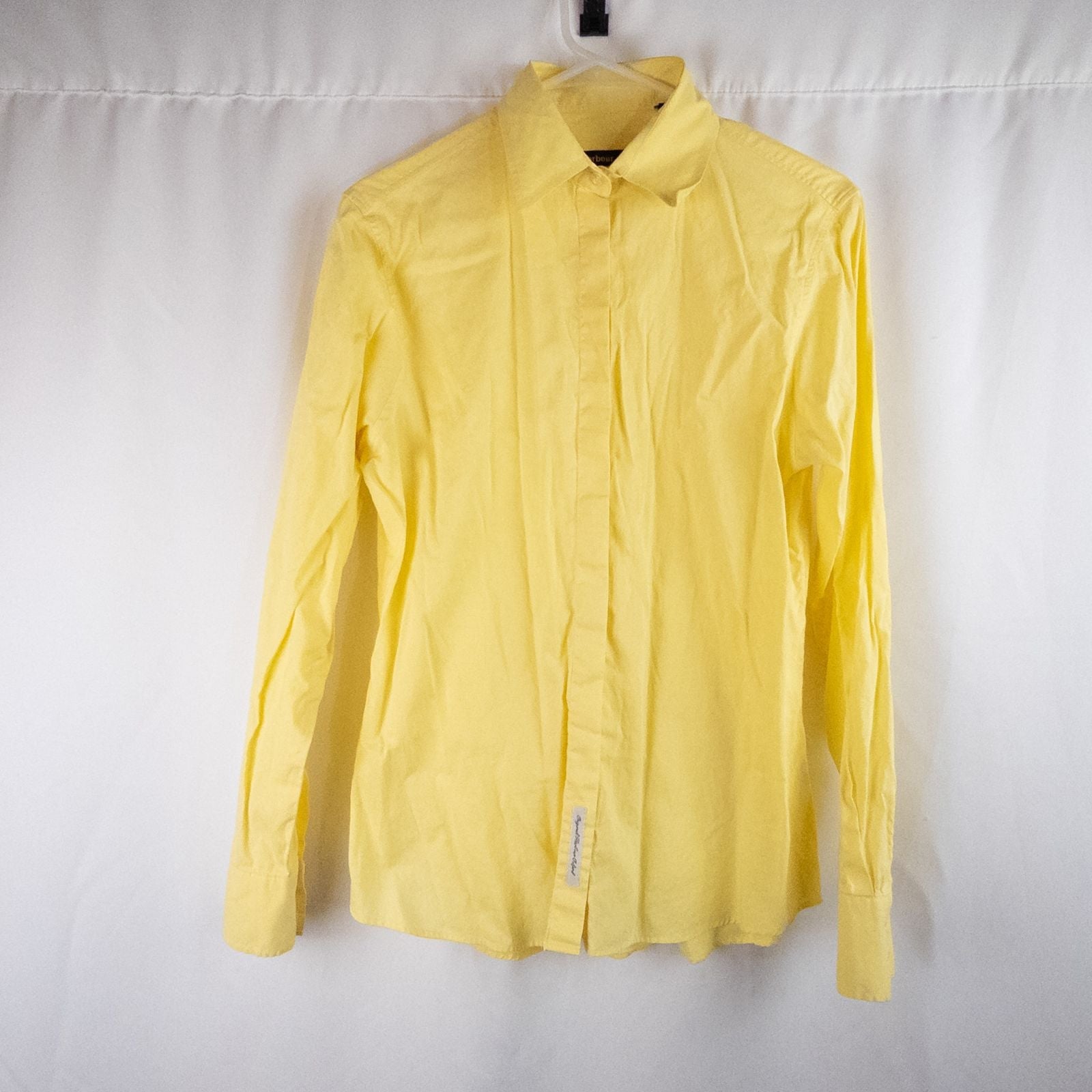 Pastel yellow Barbour original oxford long sleeve shirt laid flat showing front, collar, cuffs and back views