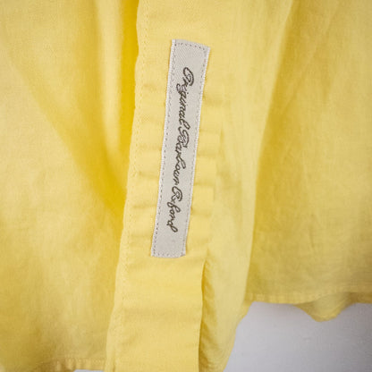 Pastel yellow Barbour original oxford long sleeve shirt laid flat showing front, collar, cuffs and back views image 10