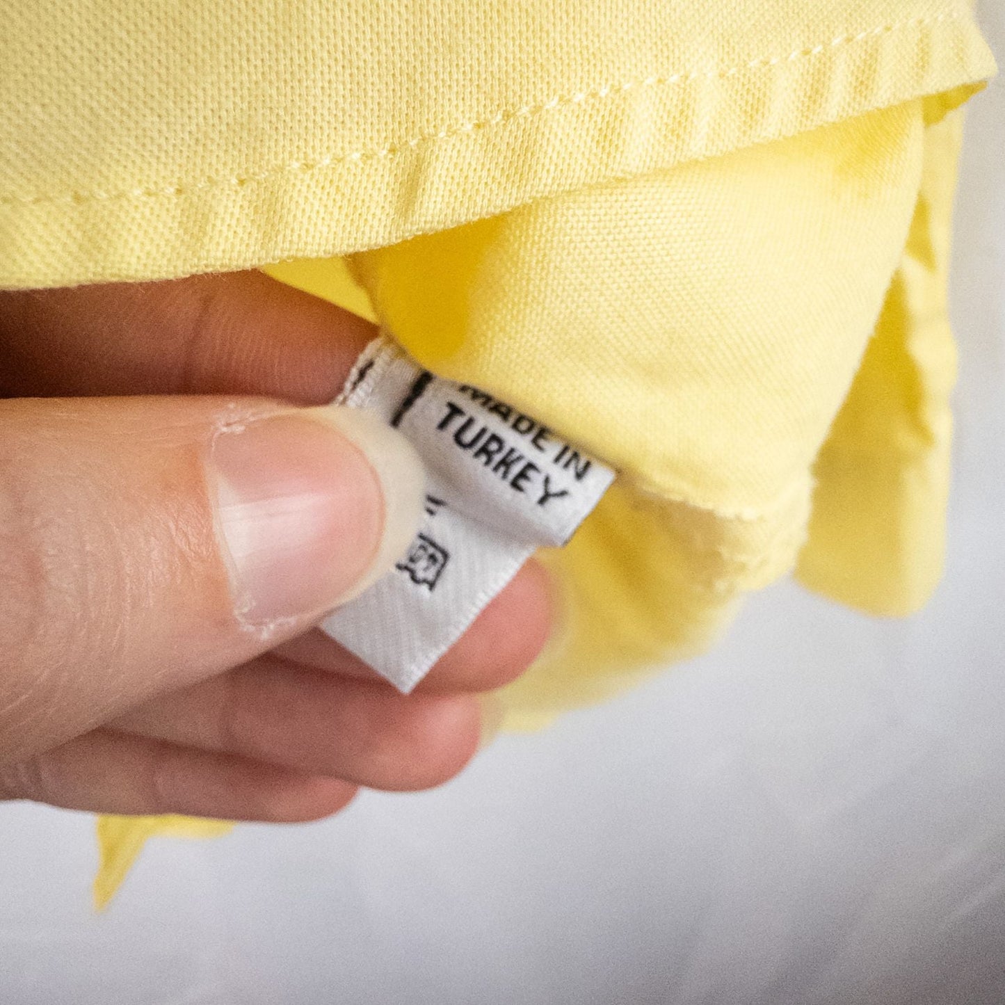 Pastel yellow Barbour original oxford long sleeve shirt laid flat showing front, collar, cuffs and back views image 11