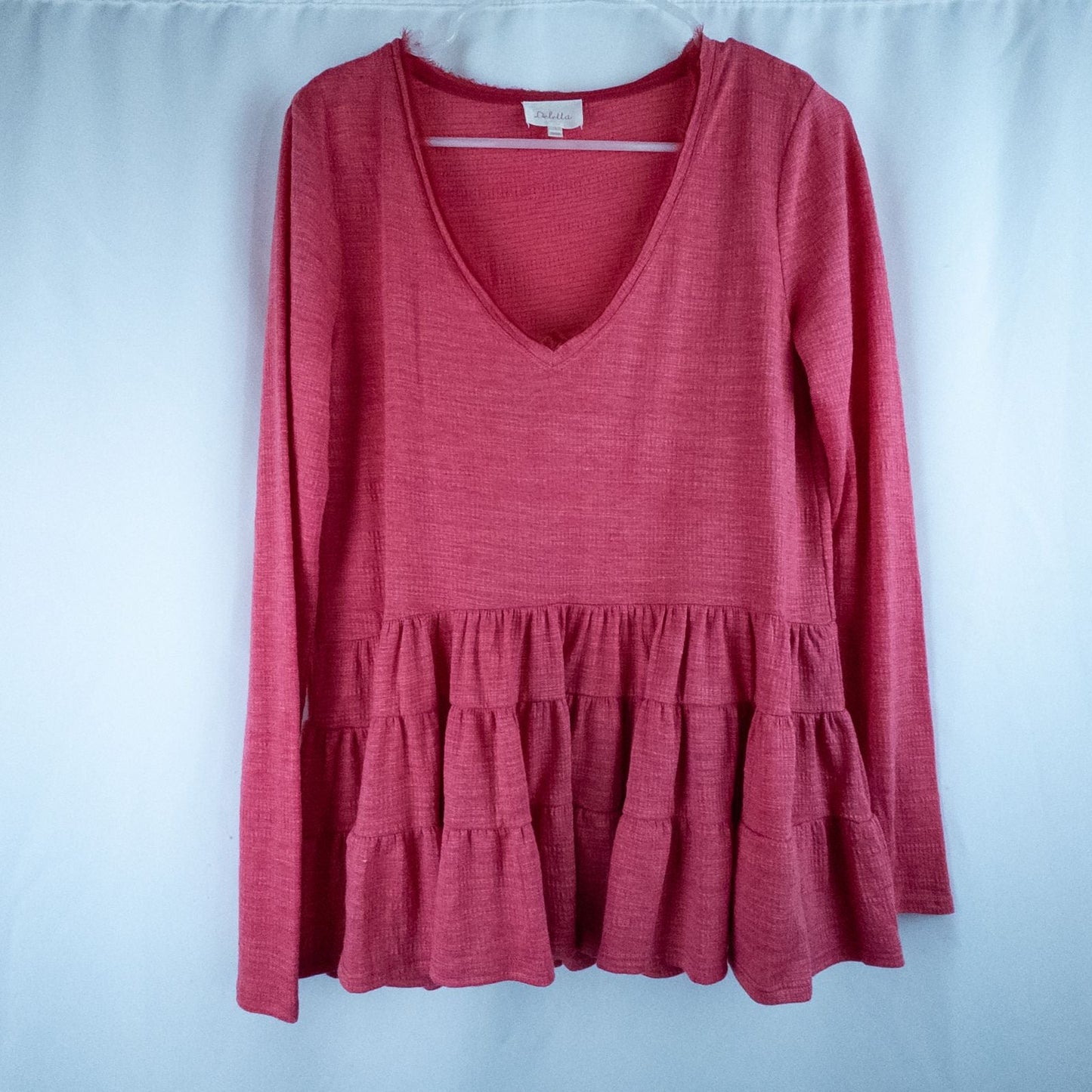 Anthropologie Deletta pink tiered ruffle long sleeve top with v-neckline and textured knit fabric