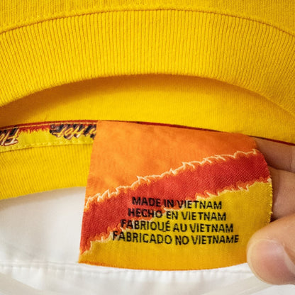 Yellow long sleeve shirt with Cheetos flame-breathing mascot graphic on front and flaming hot text on back image 11