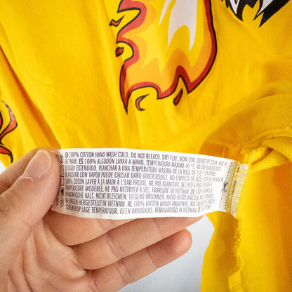Yellow long sleeve shirt with Cheetos flame-breathing mascot graphic on front and flaming hot text on back image 12