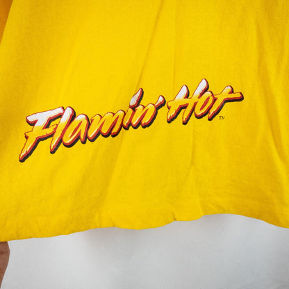 Yellow long sleeve shirt with Cheetos flame-breathing mascot graphic on front and flaming hot text on back image 6