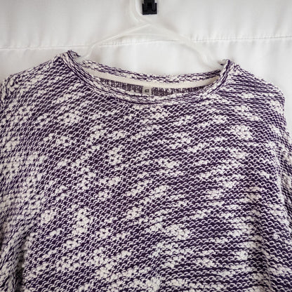 Purple and white striped open knit Fabletics sweater with textured yarn and relaxed oversized fit, shown front and close-up of knit texture and minor snags image 2