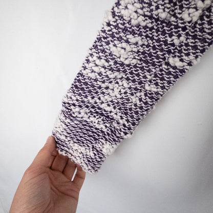 Purple and white striped open knit Fabletics sweater with textured yarn and relaxed oversized fit, shown front and close-up of knit texture and minor snags image 5