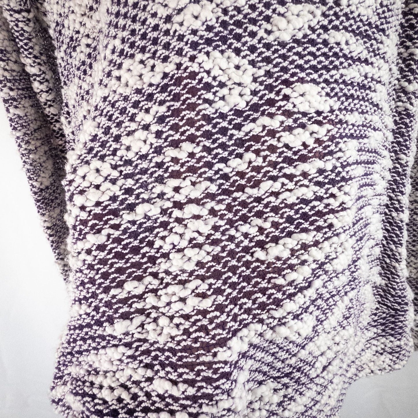 Purple and white striped open knit Fabletics sweater with textured yarn and relaxed oversized fit, shown front and close-up of knit texture and minor snags image 3