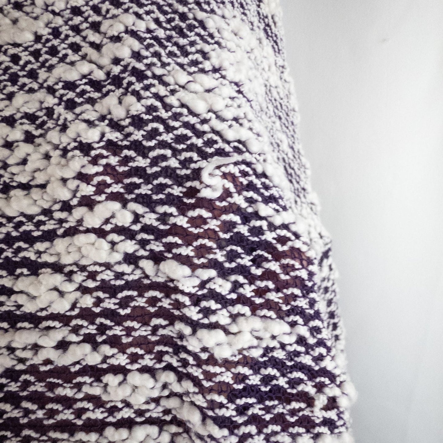 Purple and white striped open knit Fabletics sweater with textured yarn and relaxed oversized fit, shown front and close-up of knit texture and minor snags image 4