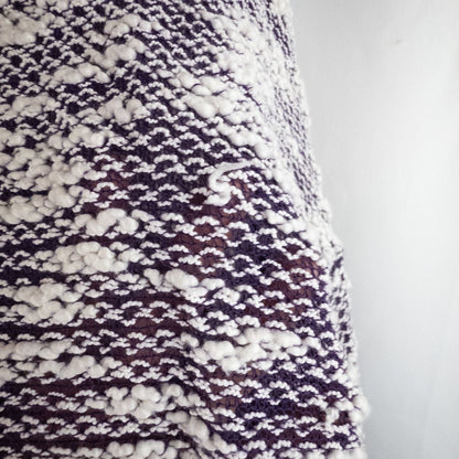 Purple and white striped open knit Fabletics sweater with textured yarn and relaxed oversized fit, shown front and close-up of knit texture and minor snags image 4