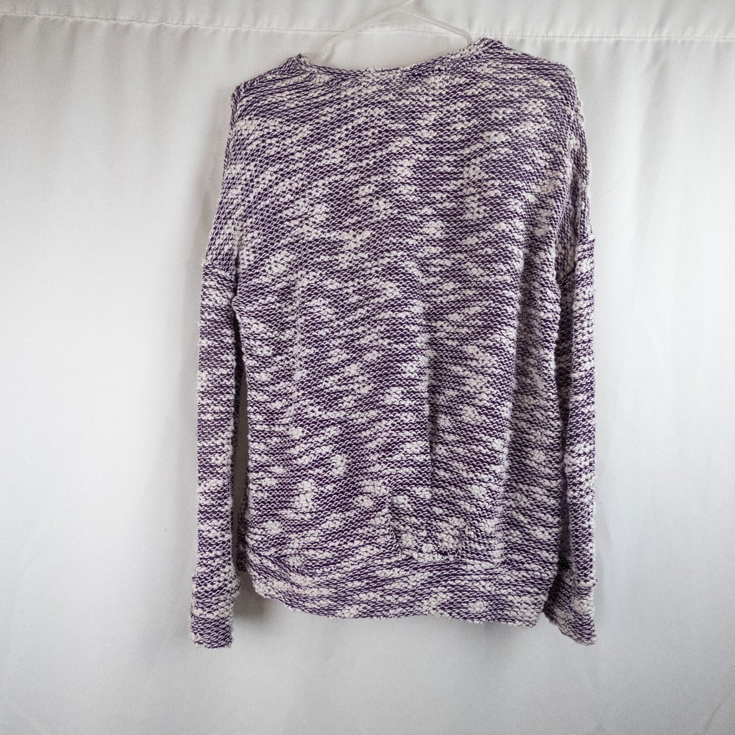Purple and white striped open knit Fabletics sweater with textured yarn and relaxed oversized fit, shown front and close-up of knit texture and minor snags image 8