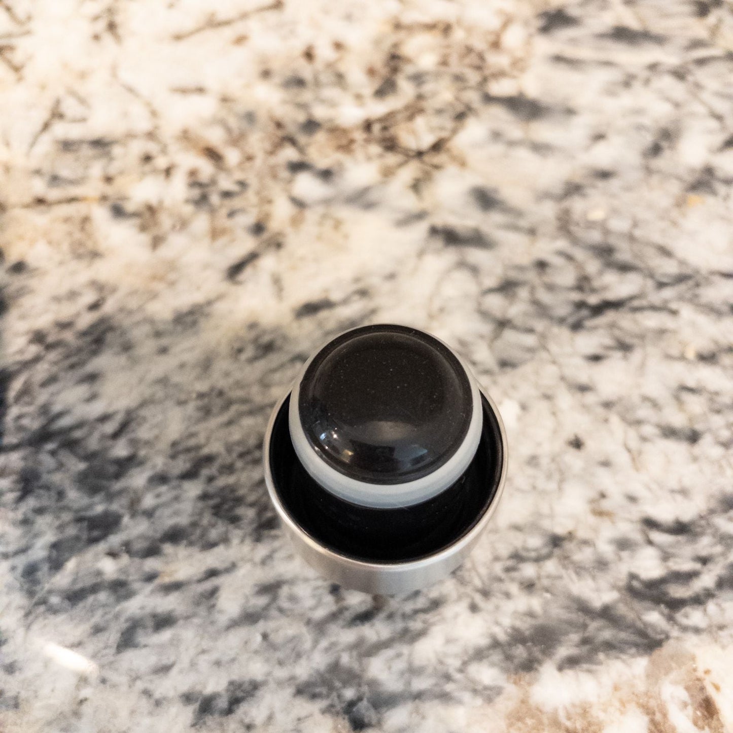 Starbucks Swizzle bottle with black white and blue artistic floral abstract print on countertop image 10