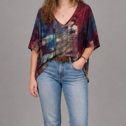 Nygard multicolor horoscope boho top with v-neck and short sleeves hanging on plastic hanger image 12