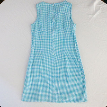 Faded Glory vintage blue and white gingham sleeveless dress with v-neck and back zipper on clear hanger against white background image 6
