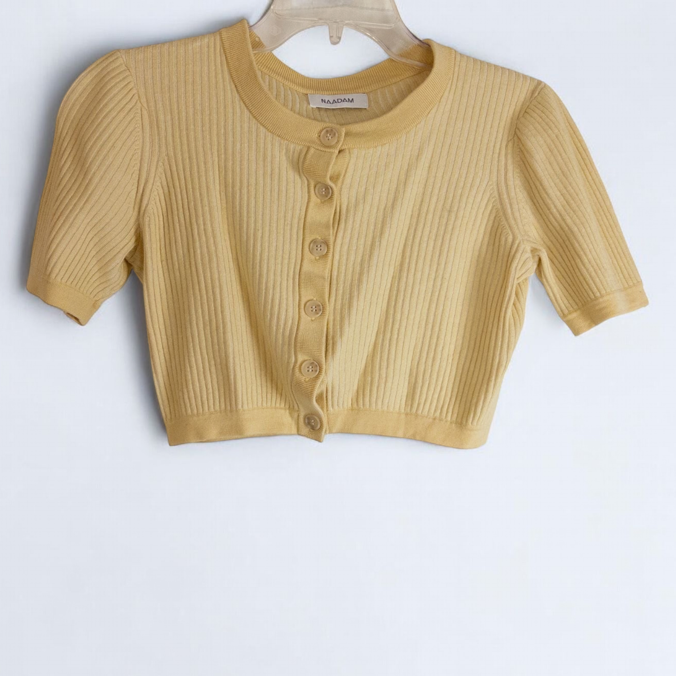 Yellow ribbed knit cropped cardigan with buttons down front and short sleeves by Naadam, size medium